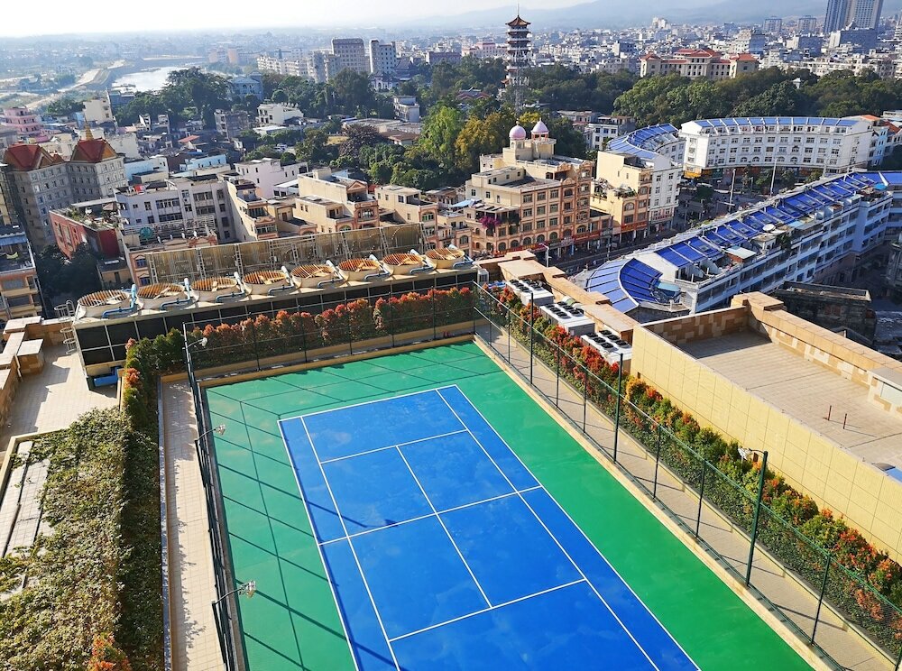 Фото Ramada Plaza Dongxing City Center