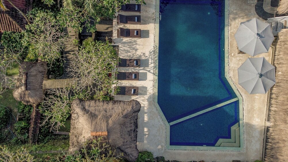 Фото Artini Cottages 1