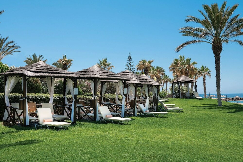 Фото Constantinou Bros Athena Beach Hotel