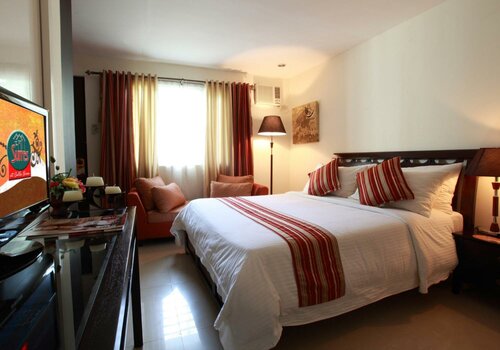 Гостиница The Suites at Calle Nueva в Баколоде