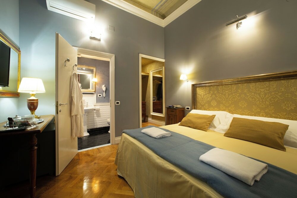 Фото Boutique B&b Torre De' Conti