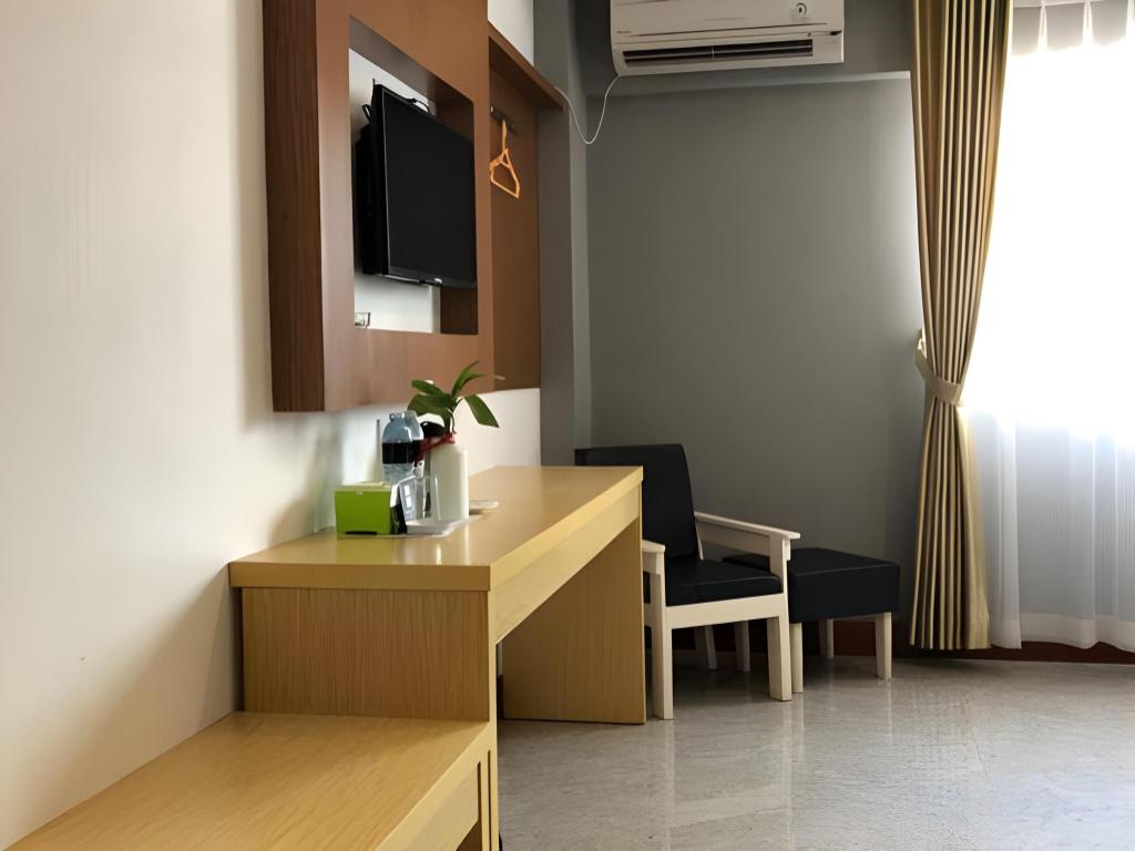 Фото Hotel Mustika Gajah Mada