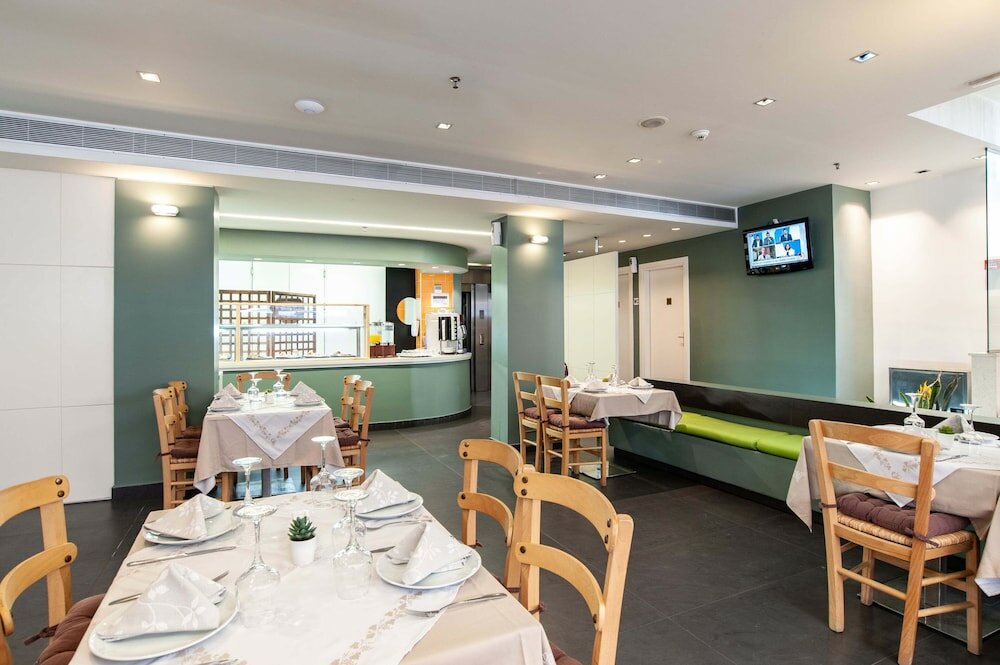 Фото Atlantis Boutique City Hotel