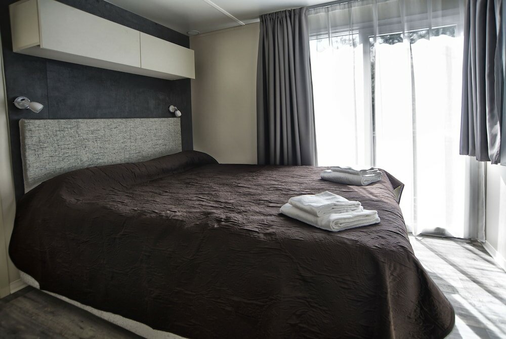 Фото Flaminio Village Bungalow Park