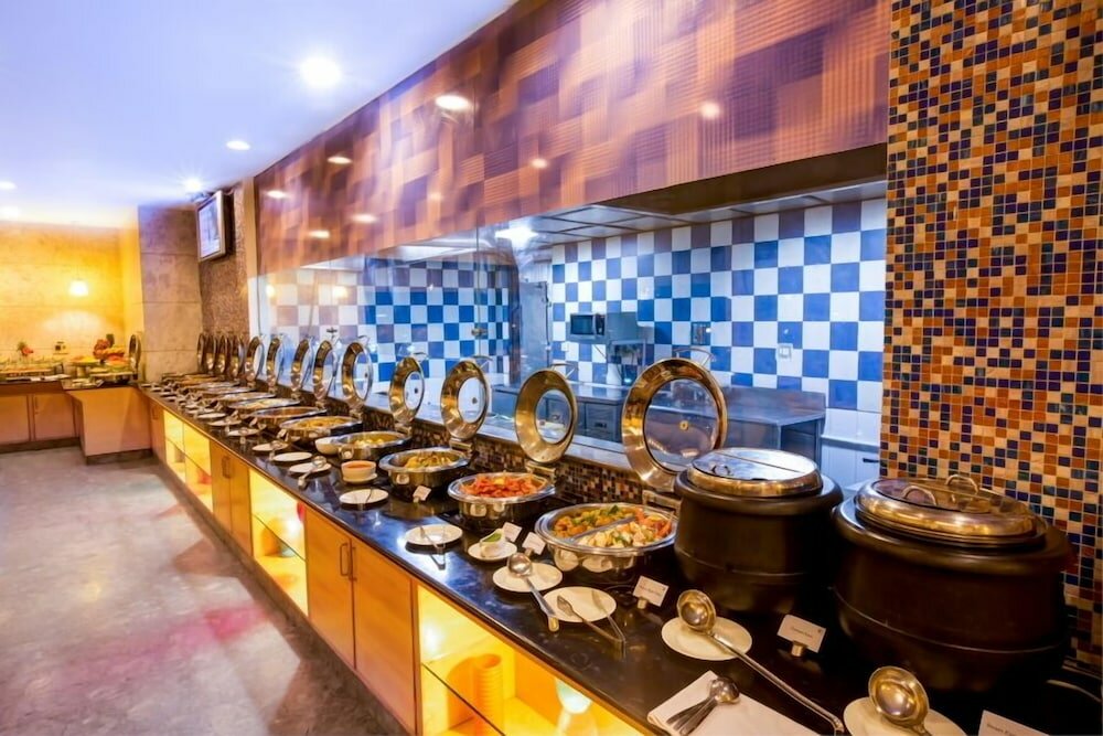 Фото Radha Hometel Whitefield