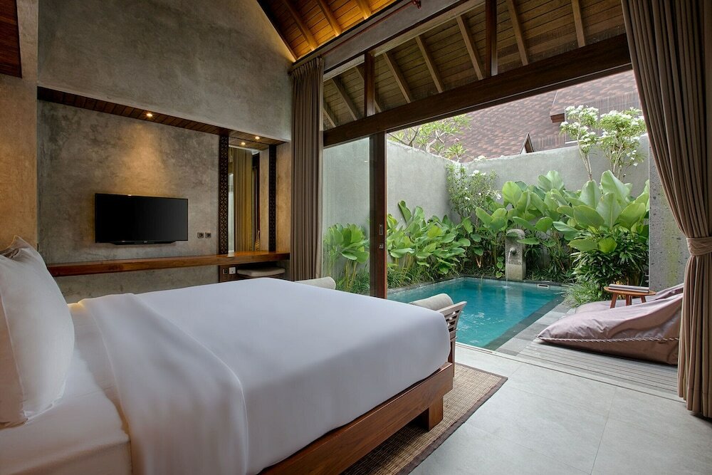 Фото Taman Dharmawangsa Suites