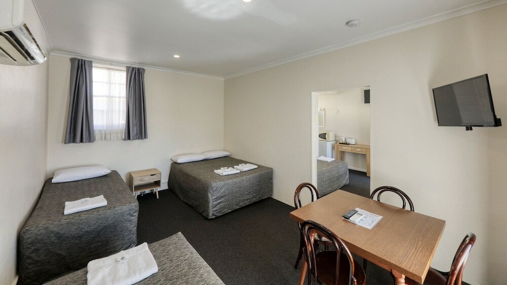 Фото Coachman Hotel Motel