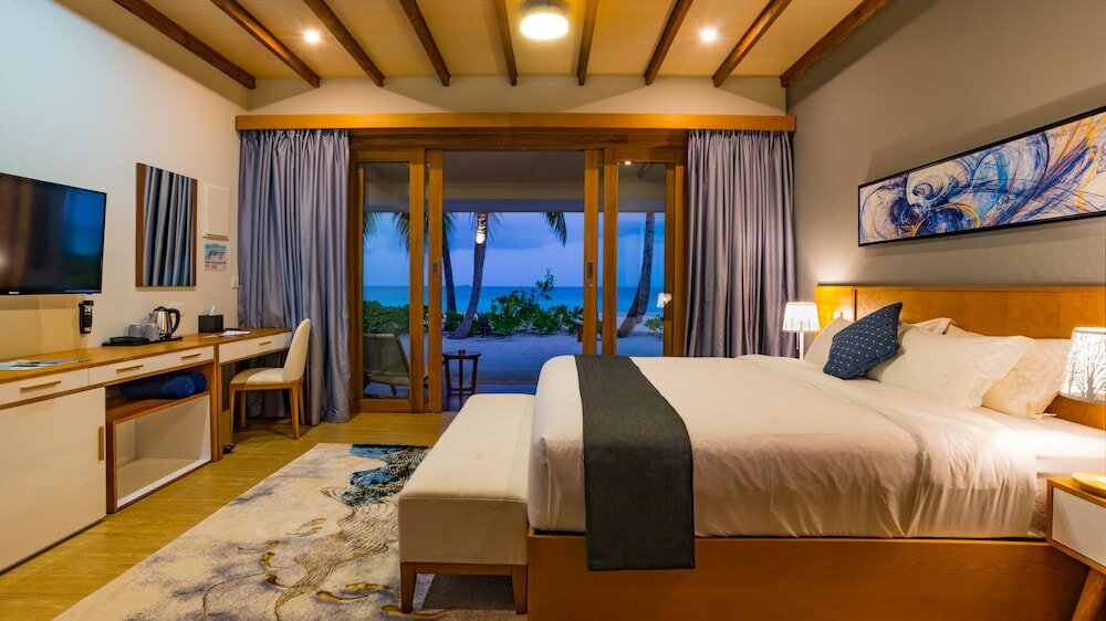 Фото Fiyavalhu Resort Maldives