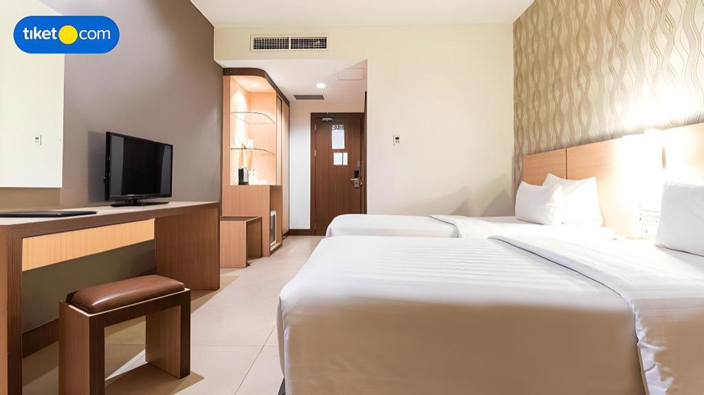 Фото Grand Impression Hotel Medan