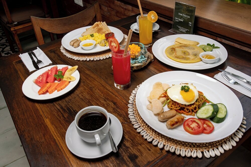 Фото Paon Desa Ubud Hotel