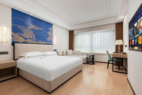 Гостиница GreenTree Inn Nantong Haimen Sanchang North Wangjiang Road Business Hotel