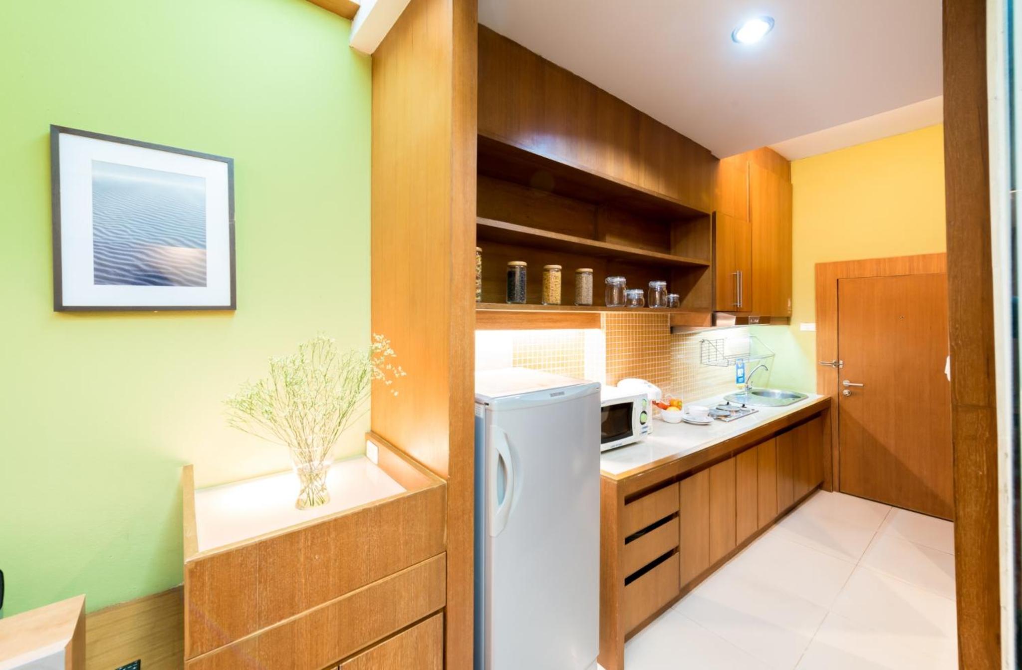 Фото Laemtong Service Apartment