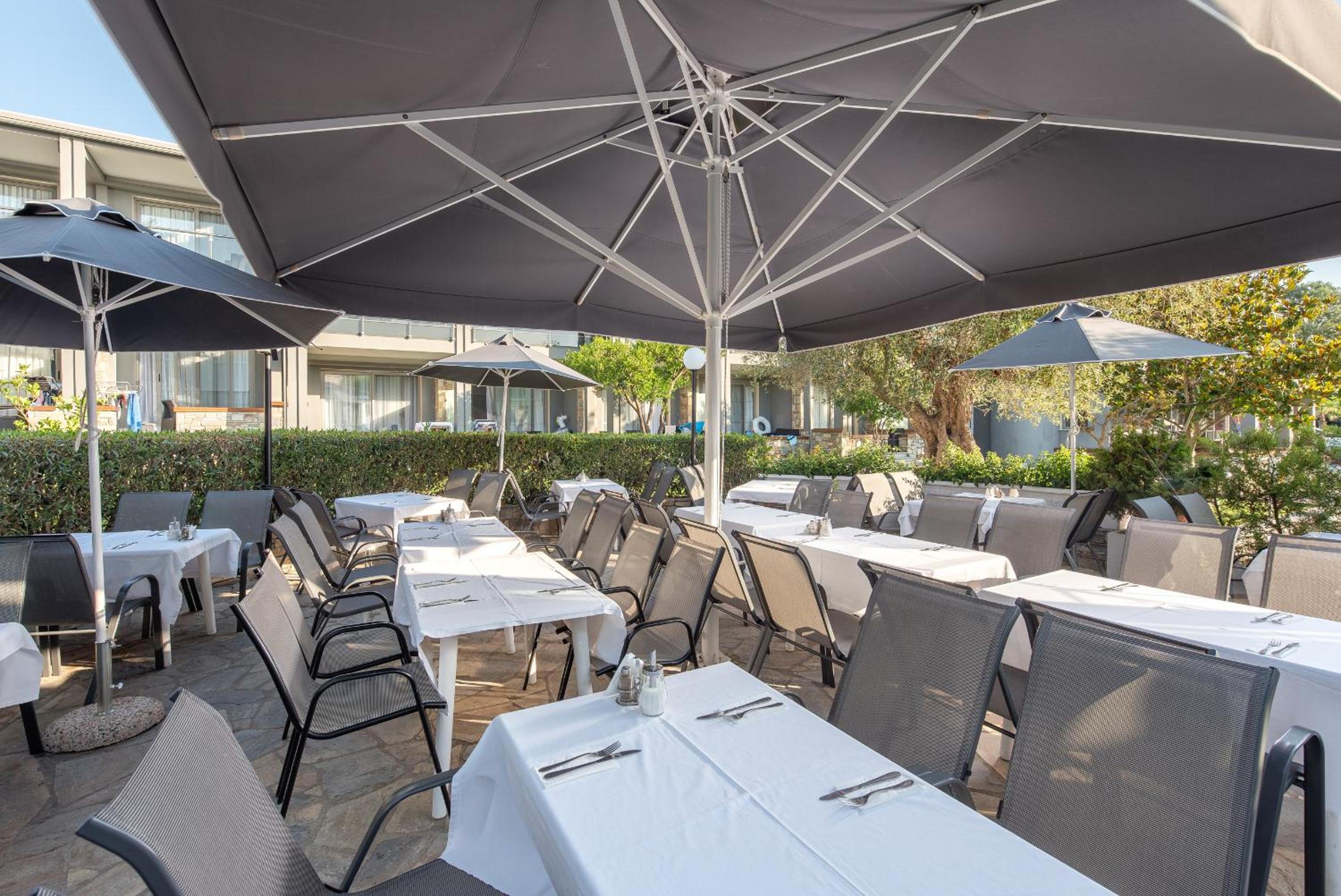 Фото Dionysos Hotel & Suites