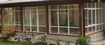 Satels-Veka (Dzerzhinskogo Street, 42), windows