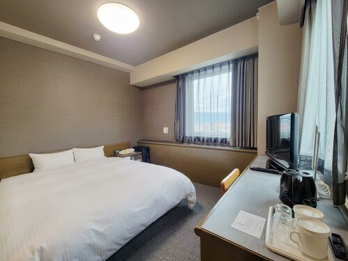 Гостиница Hotel Route-Inn Court Chikuma Koshoku