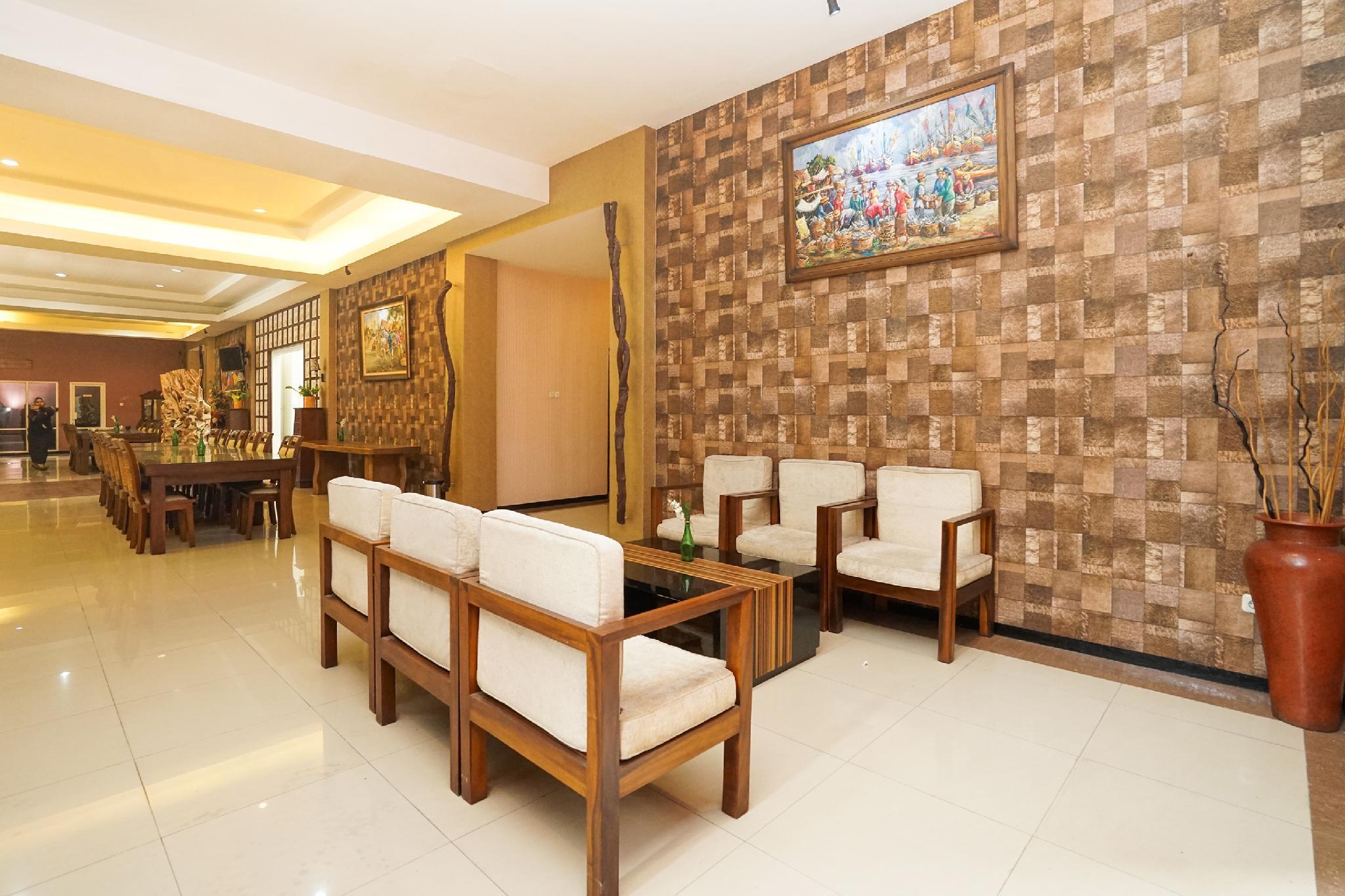 Фото Oyo 282 Putri Utari Guest House