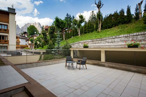 Гостиница Radisson Residences Savoia Palace Cortina d’Ampezzo в Кортина-д`Ампеццо
