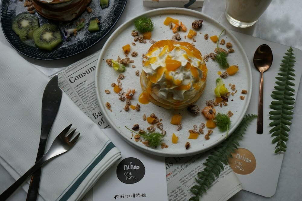 Фото Nihao Cafe Hotel