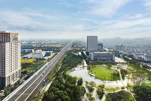 Внешний вид отеля Courtyard by Marriott Kunshan Hotel в Сучжоу, фото 5