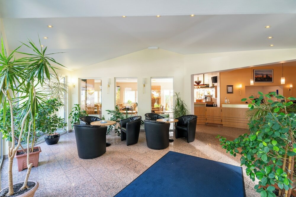 Фото Airport Businesshotel Koeln