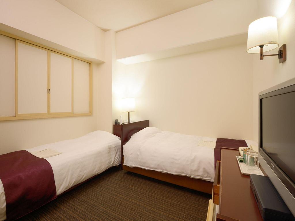 Фото Ueda Plaza Hotel