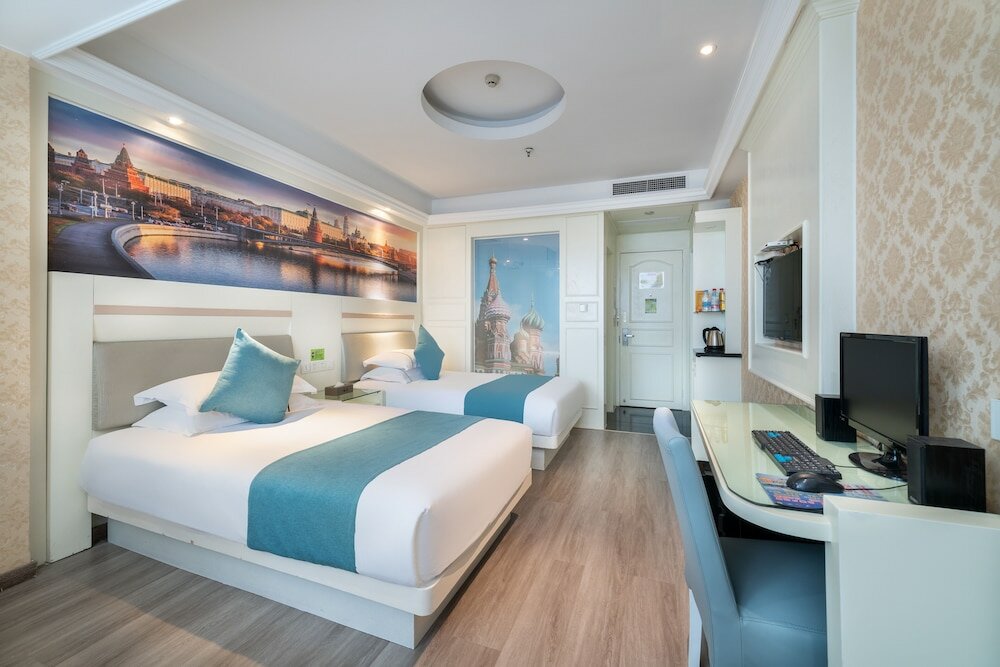 Фото Yiwu Baide Theme Hotel