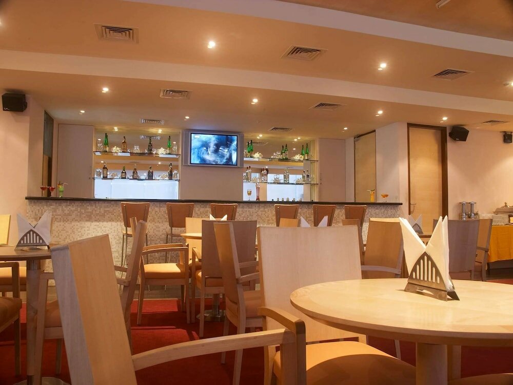 Фото Radha Hometel Whitefield