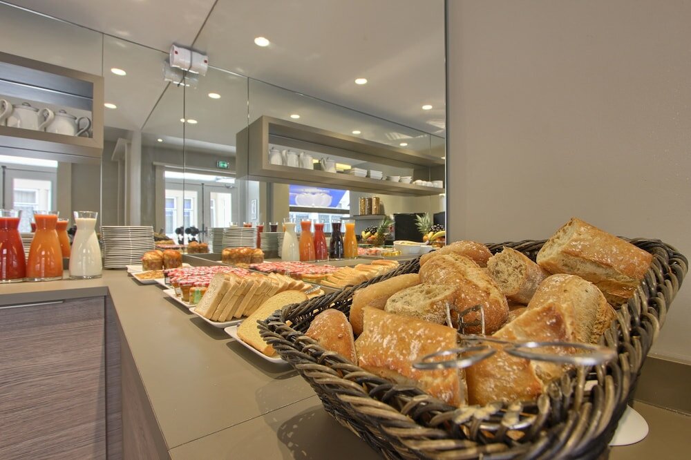 Фото Timhotel Opéra Blanche Fontaine