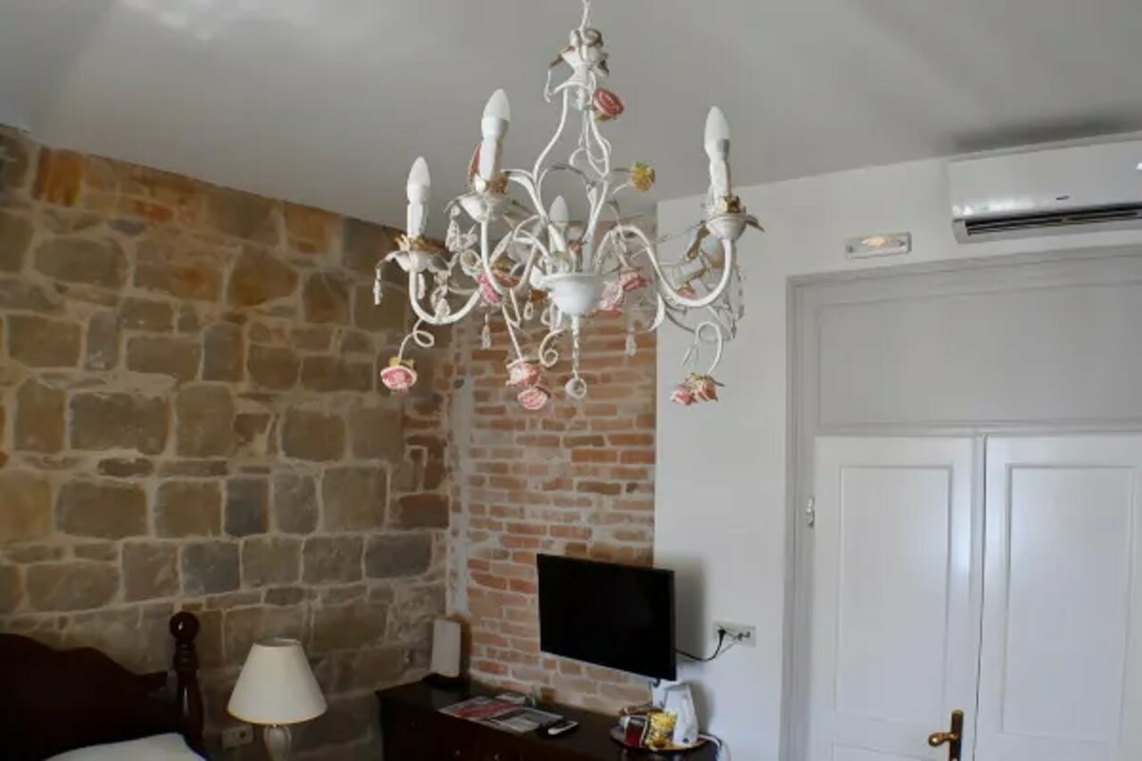 Фото Pietra Rossa Luxury Rooms