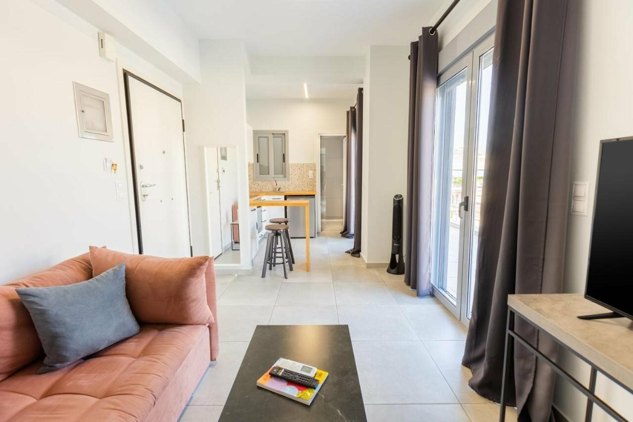 Фото Omnia Pagrati Apartments