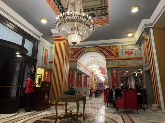 Фото Cosmopolitan Plaza Inn Hotel