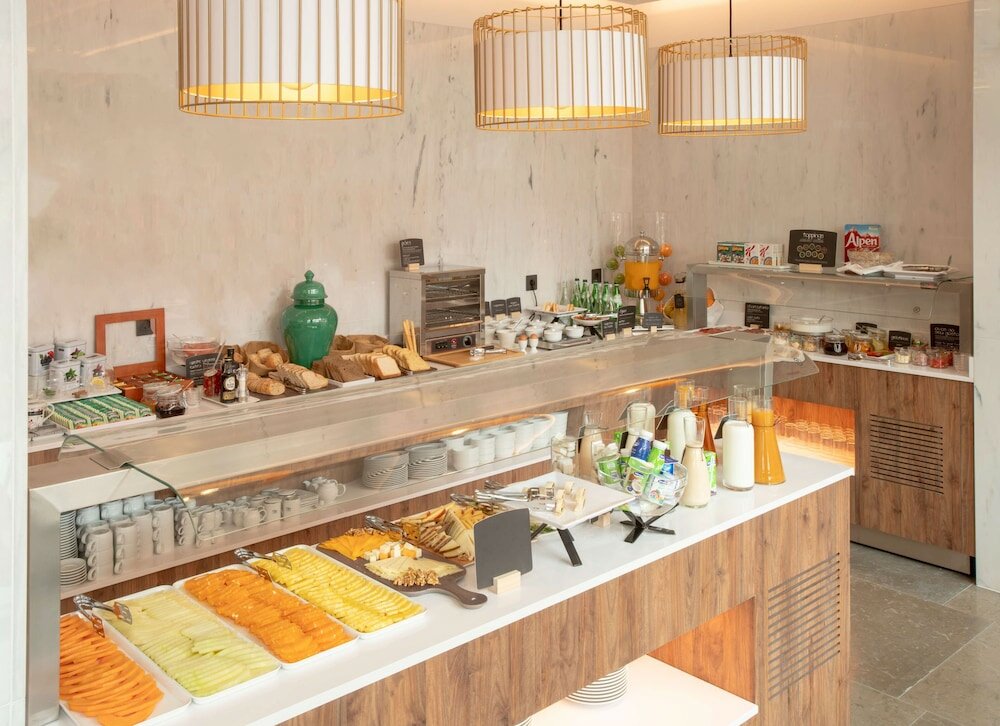 Фото Nh Hotel Porto Jardim