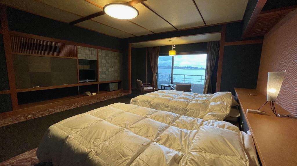 Фото Katayamazu Onsen Kanoya Korakuen