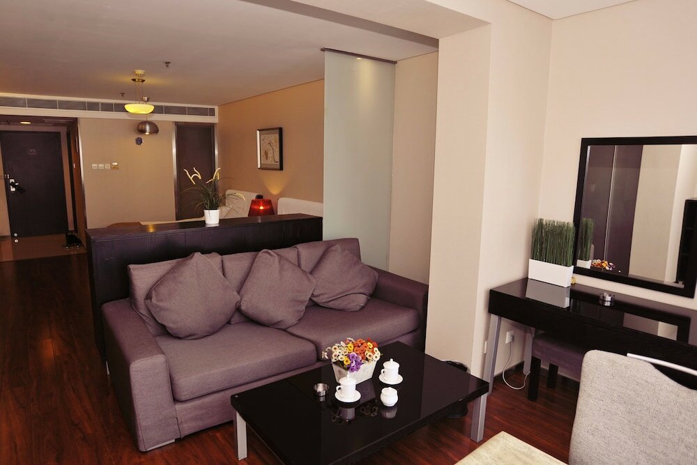 Фото Qingdao Housing International Hotel