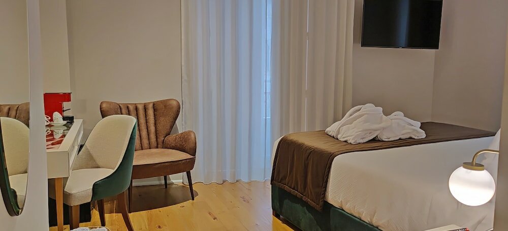 Фото Casa dos Ofícios Hotel