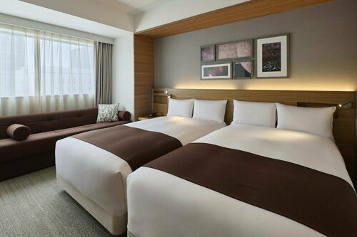 Гостиница Cross Hotel Sapporo в Саппоро