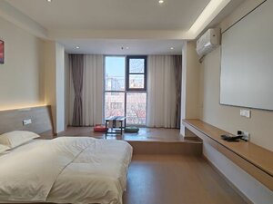 Qiancheng Hotel (3rd Floor, Defu Building Materials Market, Intersection of Zhenxing Road and Danyang Road), hotel