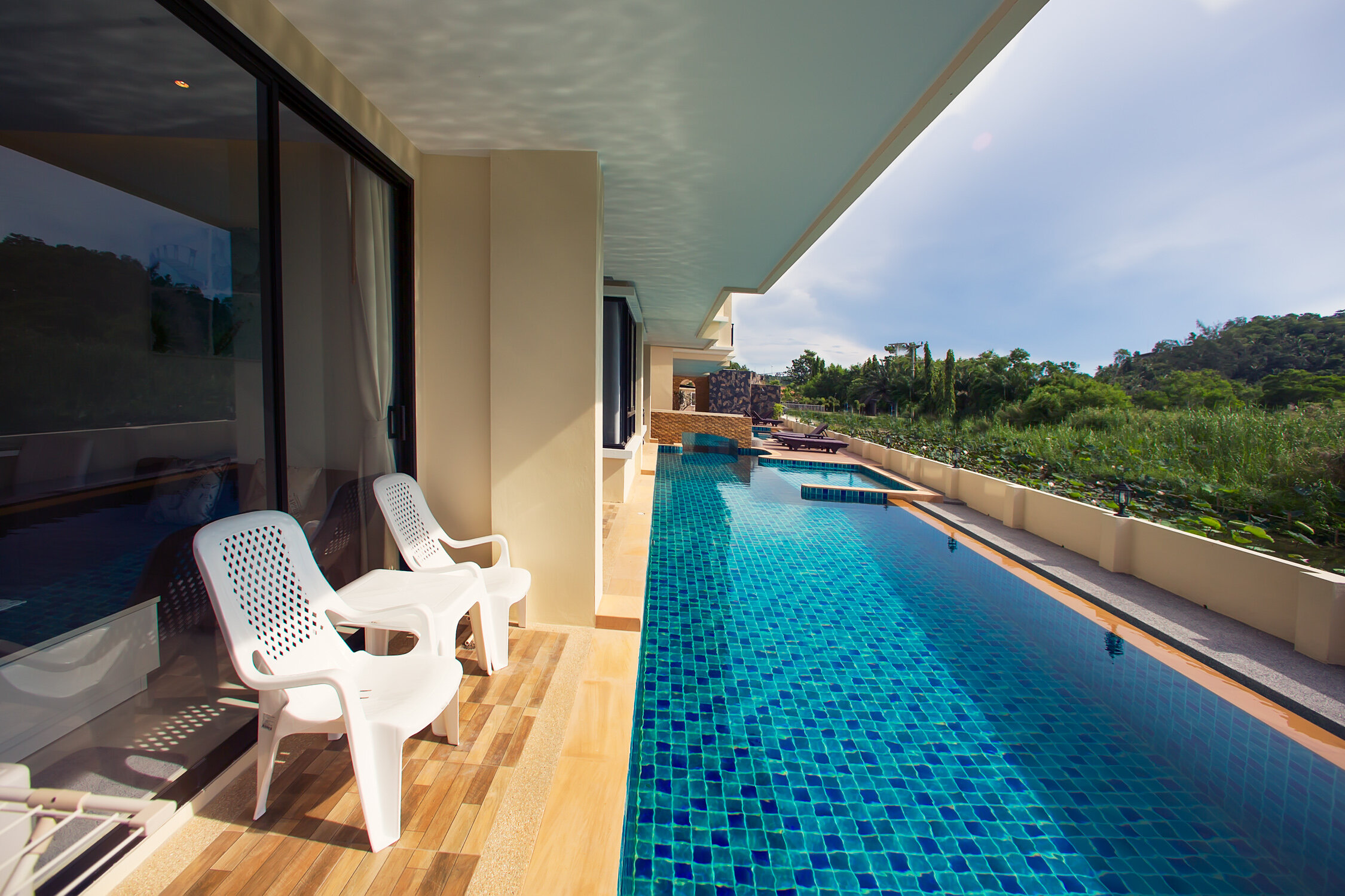 Фото The Lago Apartments by Tropiclook