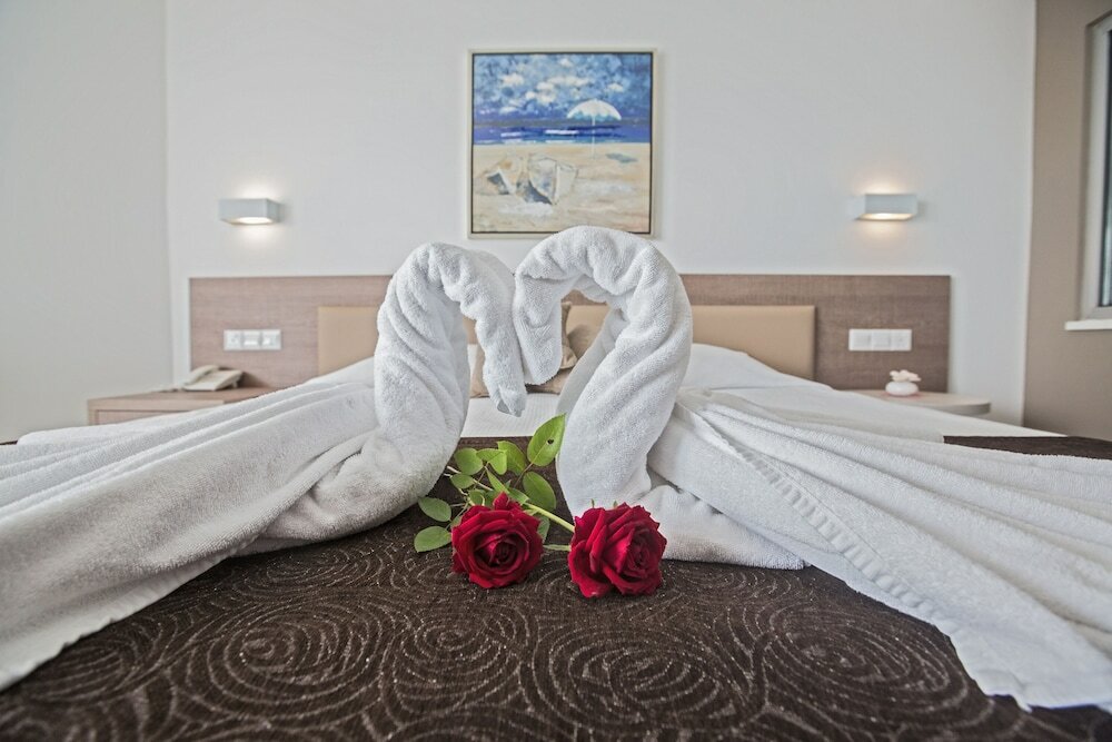 Фото Vassos Nissi Plage Hotel & SPA