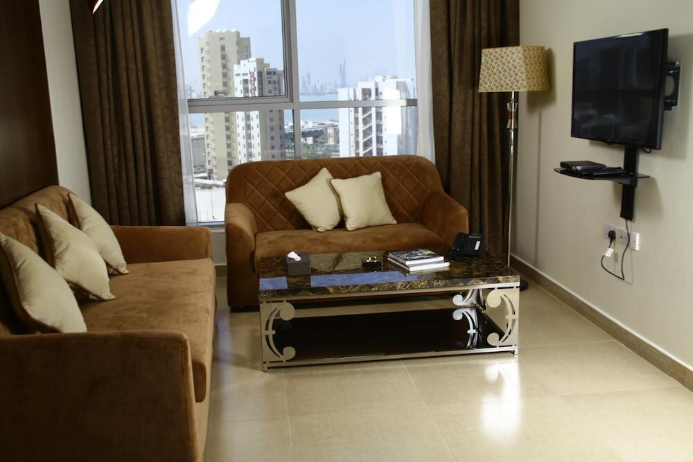 Фото Laguna Hotel Suites