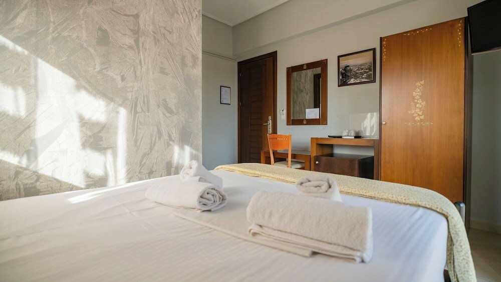 Фото Toti Boutique Rooms