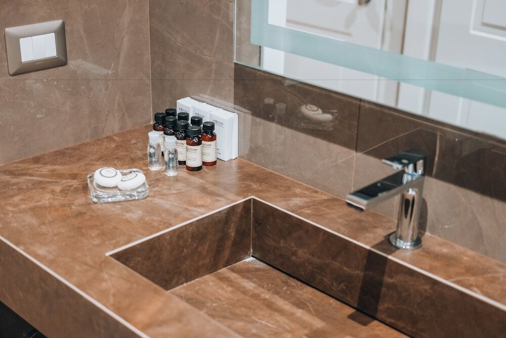 Фото Caruso Place Boutique & Wellness Suites