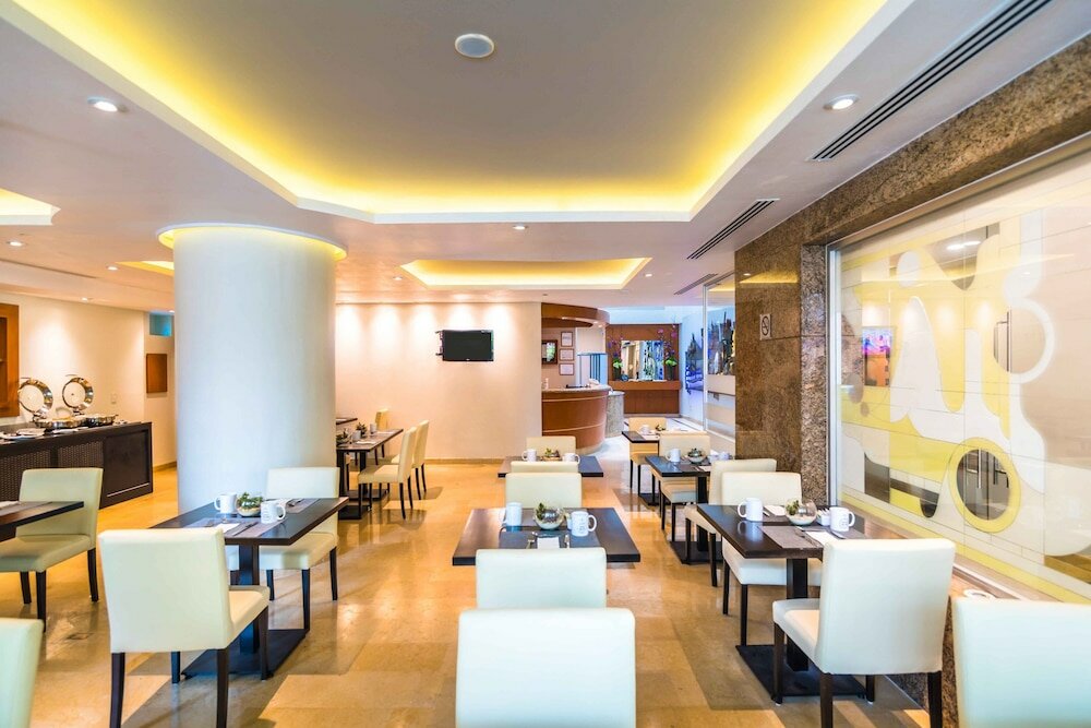 Фото Eurostars Zona Rosa Suites