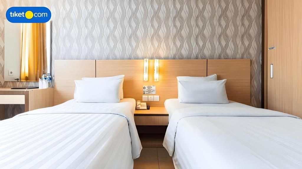 Фото Grand Impression Hotel Medan