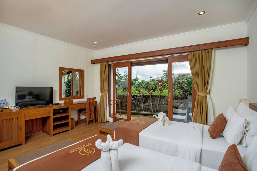 Фото Paon Desa Ubud Hotel