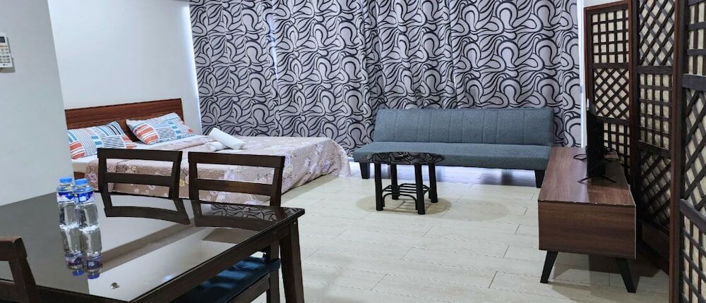 Фото Tess and Tessha Condotel near T3 Airport