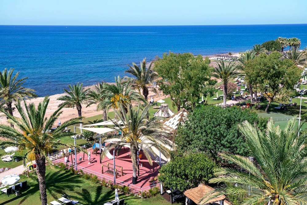 Фото Constantinou Bros Athena Beach Hotel