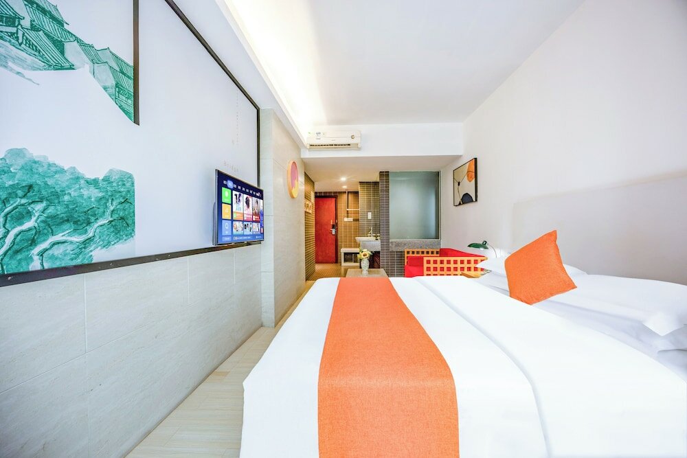 Фото Guangzhou Timmy Hotel