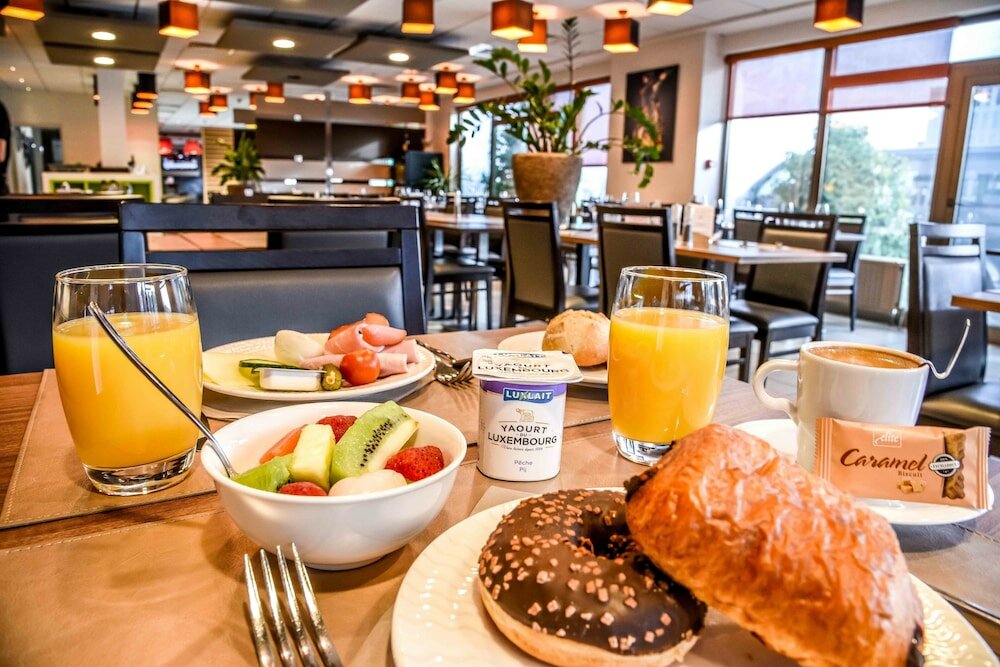 Фото Mandarina Hotel Luxembourg Airport