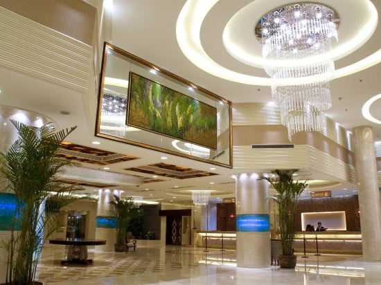 Фото Qingdao Kuaitong International Hotel